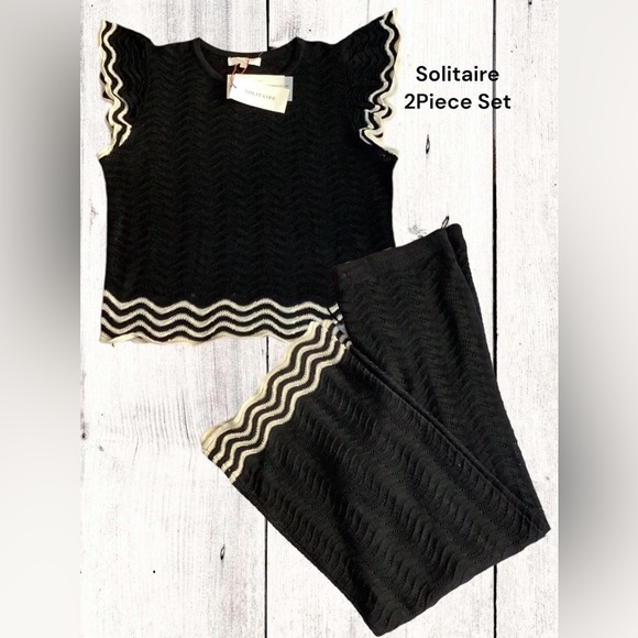 Solitaire NWT 2 Piece Set Chic Black and Cream Knit Top With Flare Pants Crochet - Picture 1 of 8